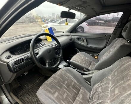 Серый Мазда 626, объемом двигателя 2.5 л и пробегом 235 тыс. км за 1500 $, фото 12 на Automoto.ua