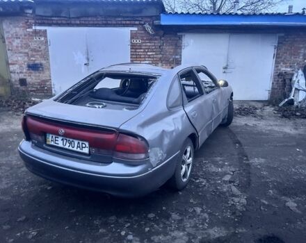 Серый Мазда 626, объемом двигателя 1.8 л и пробегом 100 тыс. км за 300 $, фото 2 на Automoto.ua