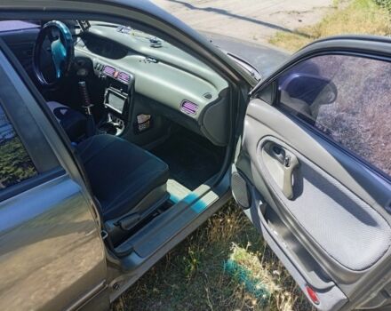 Сірий Мазда 626, об'ємом двигуна 2 л та пробігом 400 тис. км за 2100 $, фото 4 на Automoto.ua