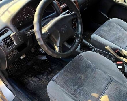 Серый Мазда 626, объемом двигателя 1.8 л и пробегом 322 тыс. км за 2500 $, фото 4 на Automoto.ua