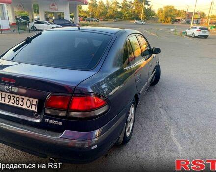 Серый Мазда 626, объемом двигателя 2 л и пробегом 439 тыс. км за 2500 $, фото 7 на Automoto.ua