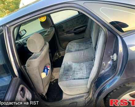 Серый Мазда 626, объемом двигателя 2 л и пробегом 439 тыс. км за 2500 $, фото 2 на Automoto.ua
