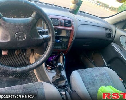 Серый Мазда 626, объемом двигателя 2 л и пробегом 439 тыс. км за 2500 $, фото 1 на Automoto.ua