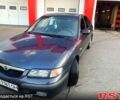 Серый Мазда 626, объемом двигателя 2 л и пробегом 439 тыс. км за 2500 $, фото 4 на Automoto.ua