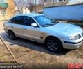 Серый Мазда 626, объемом двигателя 1.8 л и пробегом 322 тыс. км за 2500 $, фото 1 на Automoto.ua