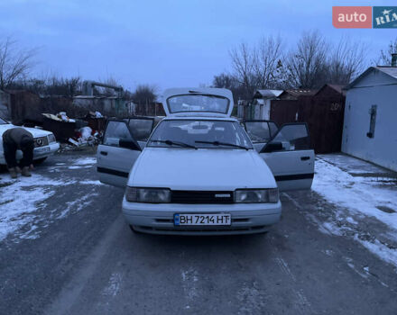 Серый Мазда 626, объемом двигателя 2 л и пробегом 301 тыс. км за 550 $, фото 1 на Automoto.ua