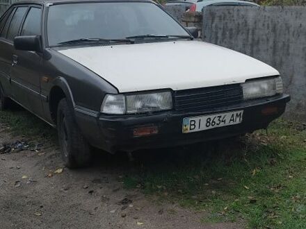 Серый Мазда 626, объемом двигателя 0 л и пробегом 350 тыс. км за 335 $, фото 1 на Automoto.ua