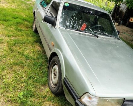 Серый Мазда 626, объемом двигателя 2 л и пробегом 477 тыс. км за 600 $, фото 1 на Automoto.ua