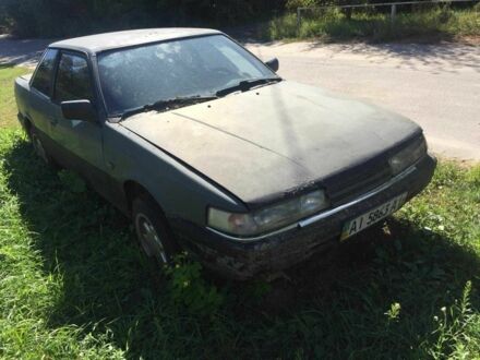 Серый Мазда 626, объемом двигателя 2 л и пробегом 999 тыс. км за 350 $, фото 1 на Automoto.ua