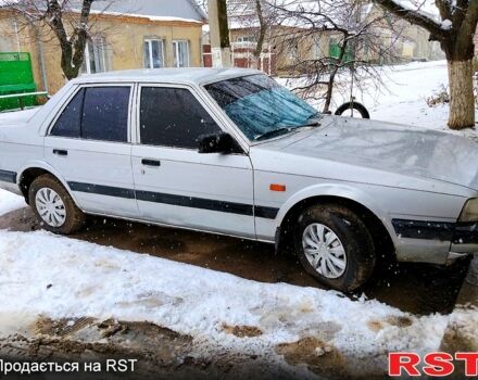 Серый Мазда 626, объемом двигателя 1.6 л и пробегом 300 тыс. км за 900 $, фото 1 на Automoto.ua