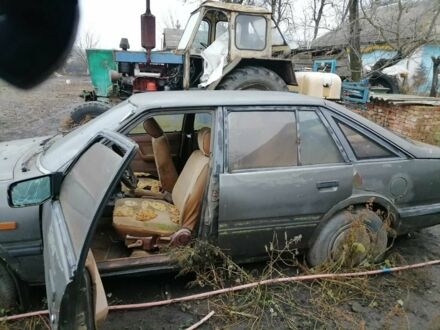 Сірий Мазда 626, об'ємом двигуна 1.6 л та пробігом 24 тис. км за 100 $, фото 1 на Automoto.ua