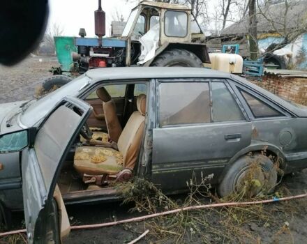 Сірий Мазда 626, об'ємом двигуна 1.6 л та пробігом 24 тис. км за 100 $, фото 1 на Automoto.ua