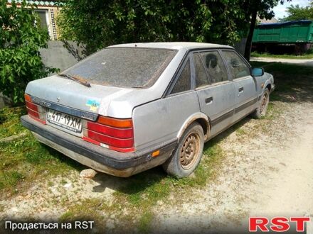 Сірий Мазда 626, об'ємом двигуна 1.8 л та пробігом 254 тис. км за 325 $, фото 1 на Automoto.ua