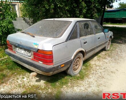 Сірий Мазда 626, об'ємом двигуна 1.8 л та пробігом 254 тис. км за 325 $, фото 1 на Automoto.ua