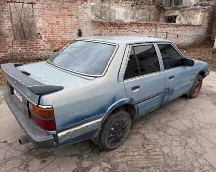 Серый Мазда 626, объемом двигателя 0 л и пробегом 200 тыс. км за 500 $, фото 1 на Automoto.ua