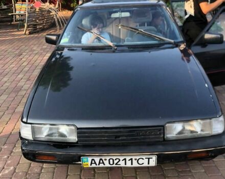 Серый Мазда 626, объемом двигателя 2 л и пробегом 300 тыс. км за 449 $, фото 1 на Automoto.ua