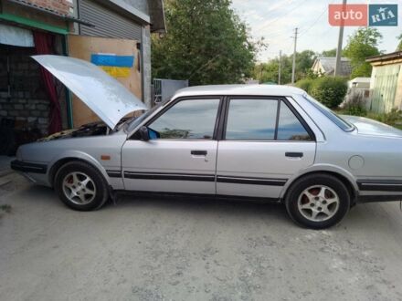 Сірий Мазда 626, об'ємом двигуна 2 л та пробігом 379 тис. км за 1002 $, фото 1 на Automoto.ua