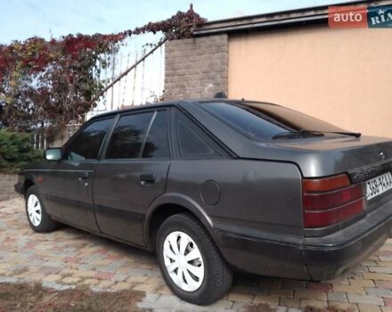 Серый Мазда 626, объемом двигателя 1.99 л и пробегом 230 тыс. км за 1800 $, фото 1 на Automoto.ua