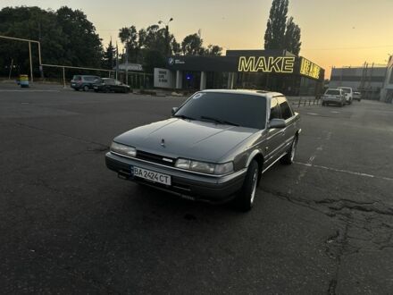 Сірий Мазда 626, об'ємом двигуна 2 л та пробігом 406 тис. км за 2099 $, фото 1 на Automoto.ua