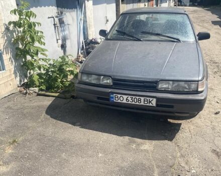 Серый Мазда 626, объемом двигателя 2 л и пробегом 300 тыс. км за 900 $, фото 1 на Automoto.ua