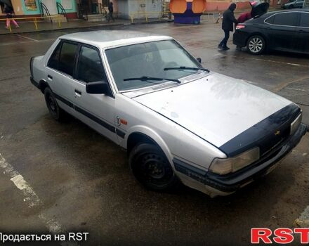 Серый Мазда 626, объемом двигателя 1.6 л и пробегом 258 тыс. км за 500 $, фото 1 на Automoto.ua