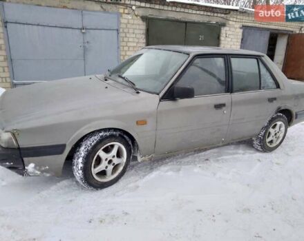 Серый Мазда 626, объемом двигателя 2 л и пробегом 100 тыс. км за 576 $, фото 1 на Automoto.ua