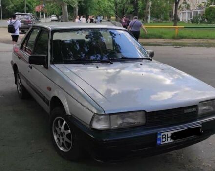 Серый Мазда 626, объемом двигателя 2 л и пробегом 412 тыс. км за 1500 $, фото 1 на Automoto.ua