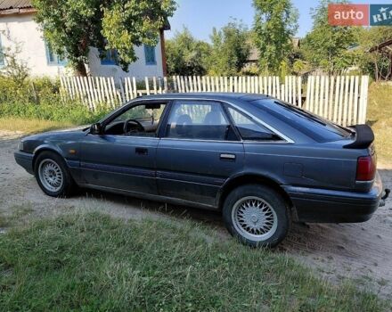 Сірий Мазда 626, об'ємом двигуна 2 л та пробігом 300 тис. км за 902 $, фото 1 на Automoto.ua