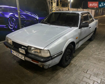 Серый Мазда 626, объемом двигателя 1.6 л и пробегом 312 тыс. км за 1200 $, фото 1 на Automoto.ua