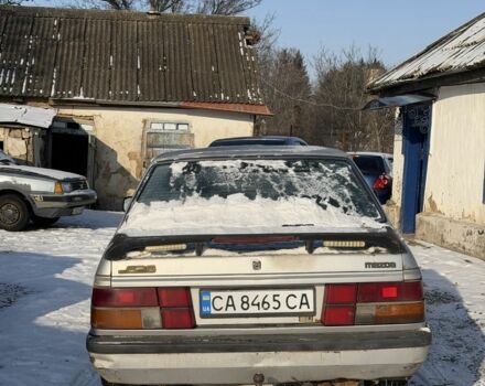 Серый Мазда 626, объемом двигателя 2 л и пробегом 200 тыс. км за 450 $, фото 1 на Automoto.ua