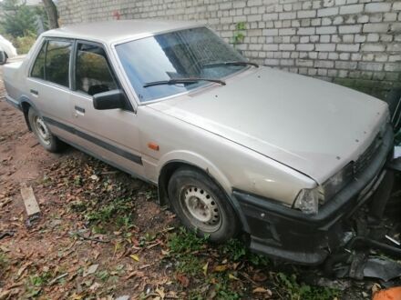 Серый Мазда 626, объемом двигателя 2 л и пробегом 400 тыс. км за 287 $, фото 1 на Automoto.ua