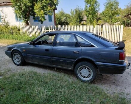 Сірий Мазда 626, об'ємом двигуна 2 л та пробігом 300 тис. км за 901 $, фото 1 на Automoto.ua