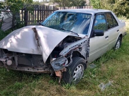 Серый Мазда 626, объемом двигателя 2 л и пробегом 201 тыс. км за 400 $, фото 1 на Automoto.ua