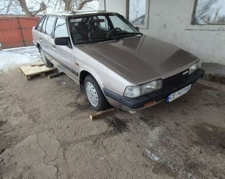 Серый Мазда 626, объемом двигателя 2 л и пробегом 225 тыс. км за 687 $, фото 1 на Automoto.ua