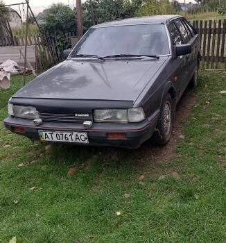 Сірий Мазда 626, об'ємом двигуна 2 л та пробігом 210 тис. км за 1000 $, фото 1 на Automoto.ua