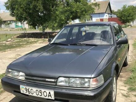 Серый Мазда 626, объемом двигателя 2 л и пробегом 286 тыс. км за 1246 $, фото 1 на Automoto.ua