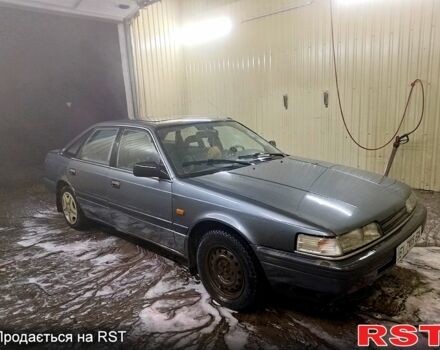 Серый Мазда 626, объемом двигателя 2.2 л и пробегом 670 тыс. км за 1000 $, фото 1 на Automoto.ua