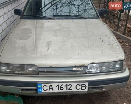 Серый Мазда 626, объемом двигателя 1.8 л и пробегом 380 тыс. км за 700 $, фото 1 на Automoto.ua