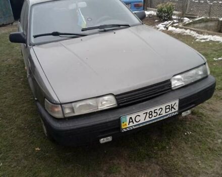 Серый Мазда 626, объемом двигателя 2 л и пробегом 350 тыс. км за 950 $, фото 1 на Automoto.ua