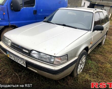 Серый Мазда 626, объемом двигателя 2 л и пробегом 400 тыс. км за 700 $, фото 1 на Automoto.ua