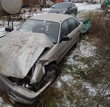 Серый Мазда 626, объемом двигателя 2 л и пробегом 400 тыс. км за 500 $, фото 1 на Automoto.ua