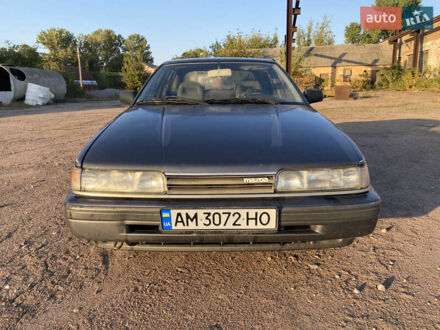 Серый Мазда 626, объемом двигателя 2 л и пробегом 297 тыс. км за 1100 $, фото 1 на Automoto.ua