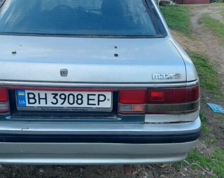 Серый Мазда 626, объемом двигателя 2 л и пробегом 200 тыс. км за 571 $, фото 1 на Automoto.ua