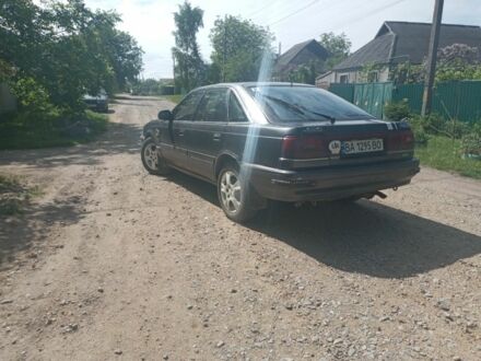 Мазда 626 1988 в Кропивницком (Кировограде) на Automoto.ua Серый Мазда 626, объемом двигателя 2 л и пробегом 250 тыс. км за 1200 $, фото 1 на Automoto.ua