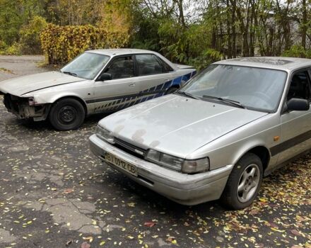 Серый Мазда 626, объемом двигателя 2 л и пробегом 200 тыс. км за 950 $, фото 1 на Automoto.ua