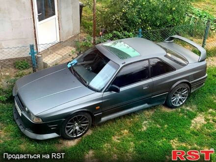 Серый Мазда 626, объемом двигателя 2 л и пробегом 250 тыс. км за 2500 $, фото 1 на Automoto.ua