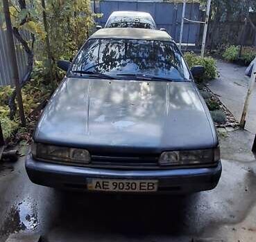 Серый Мазда 626, объемом двигателя 2 л и пробегом 396 тыс. км за 800 $, фото 1 на Automoto.ua