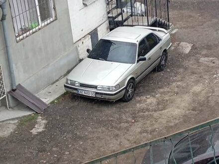 Сірий Мазда 626, об'ємом двигуна 2 л та пробігом 430 тис. км за 1350 $, фото 1 на Automoto.ua