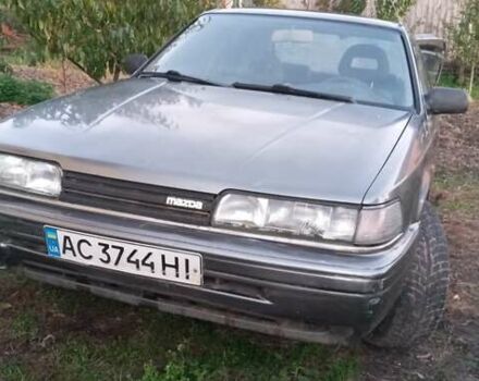 Серый Мазда 626, объемом двигателя 2 л и пробегом 384 тыс. км за 1000 $, фото 1 на Automoto.ua