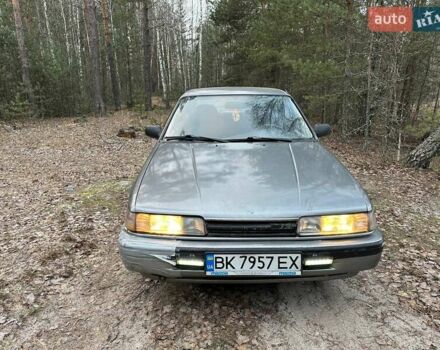 Серый Мазда 626, объемом двигателя 2 л и пробегом 470 тыс. км за 1000 $, фото 1 на Automoto.ua